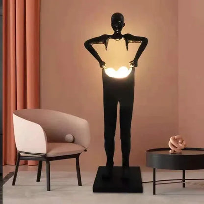 Man Carrying Pants Statue Floor Lamp