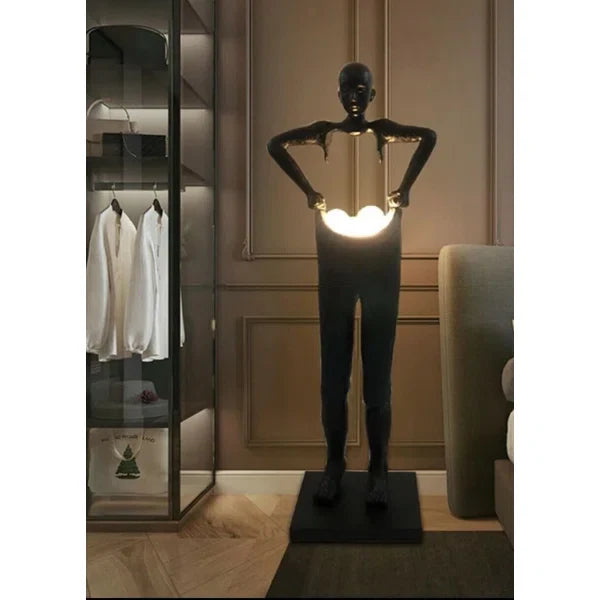 Man Carrying Pants Statue Floor Lamp