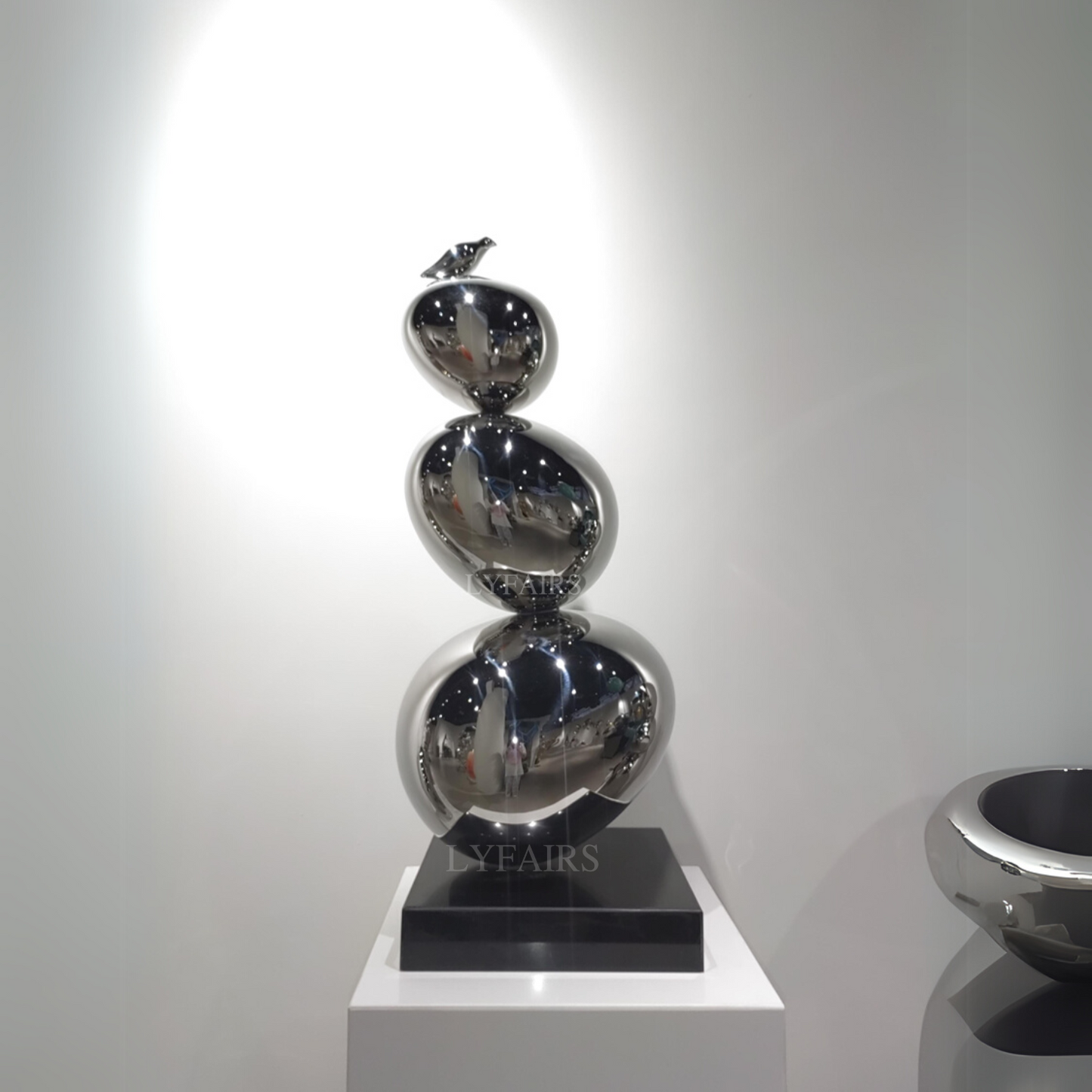 Stainless Steel Triple Stacked Pebble Sculpture with Resting Bird