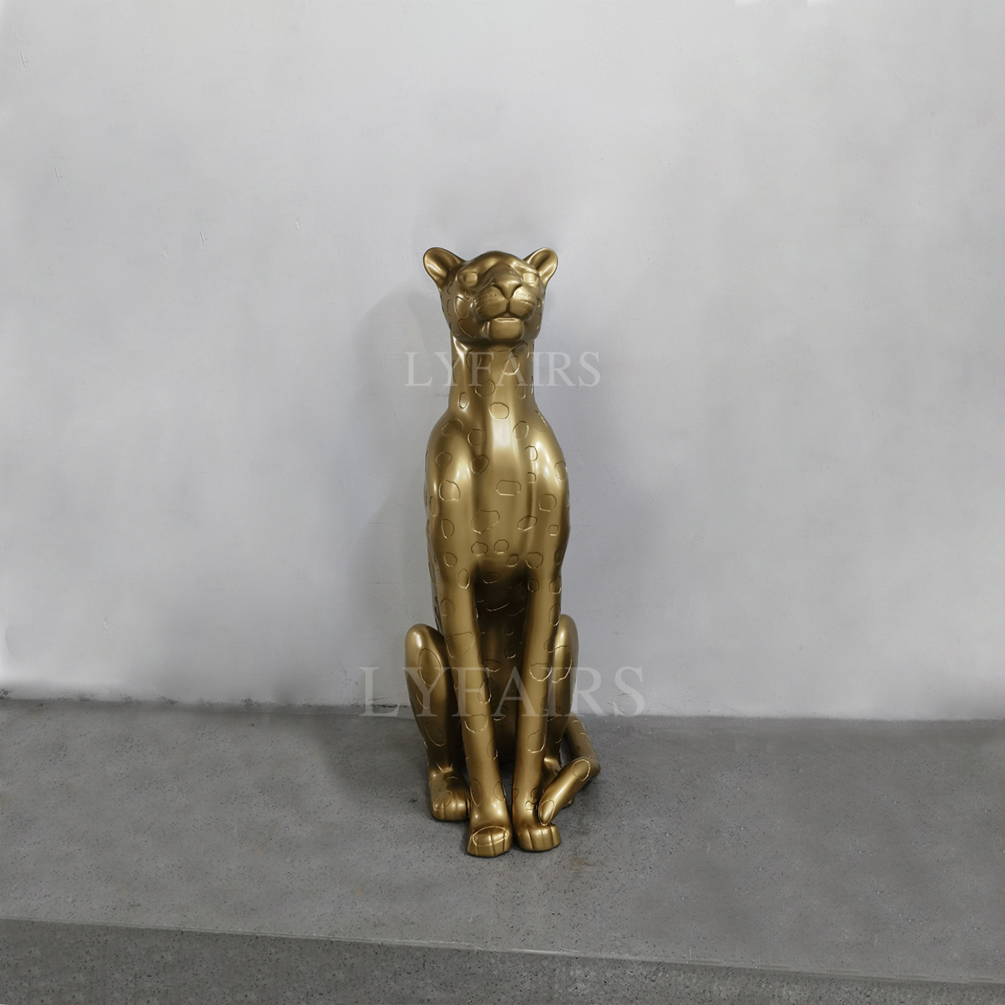 Golden Cheetah Sitting Sculpture