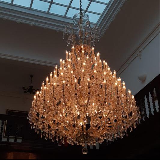 chandelier,chandeliers,candle,branch,pendant,gold,luxury,raindrop,teardrop,crystal,metal,clear,traditional,tiers,layers,foyer,living room,entrys,stairs,dining room,hotel lobby,extra large,oversized,large,huge,big